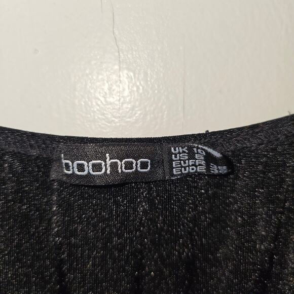 Boohoo
Women's black Maxi dress with split
Size 6
Short sleeves with spaghetti - Picture 2 of 3